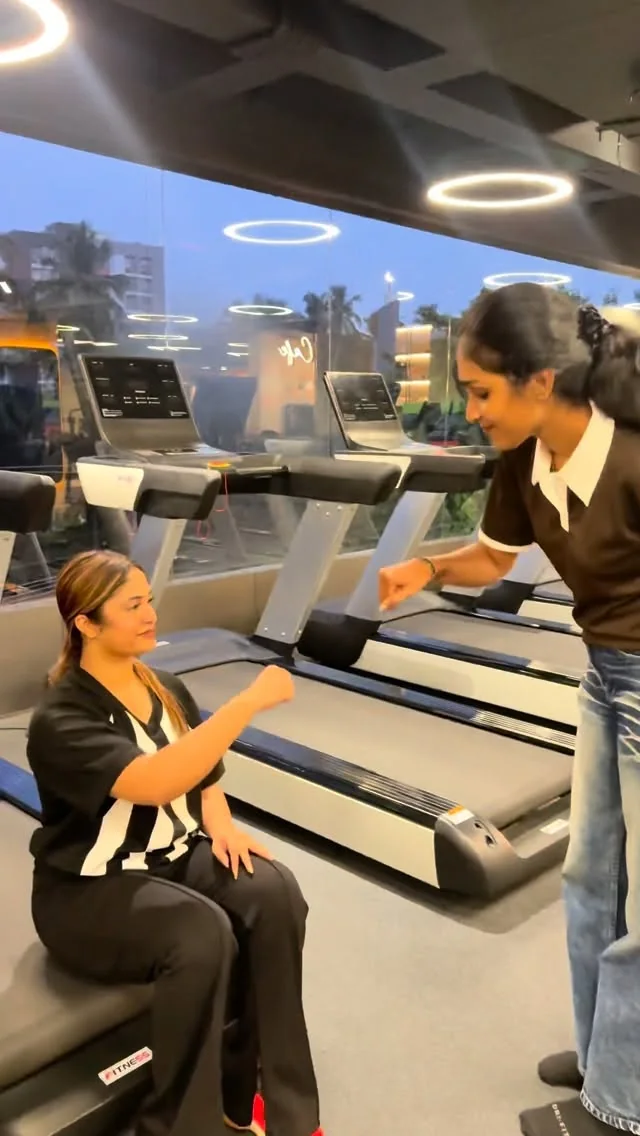 Fitora cardio zone with premium treadmills and floor-to-ceiling windows